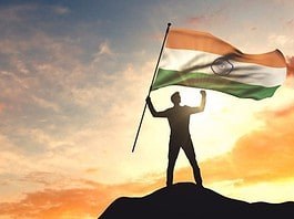 Man holding the flag of India