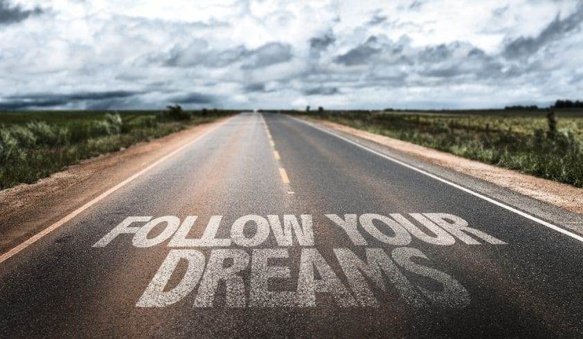 Follow your dream written on the road