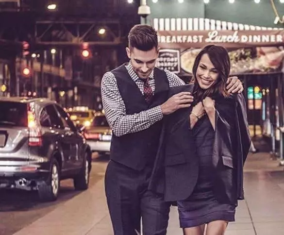 man-giving-his-jacket-to-his-girlfriend