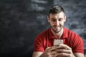 man texting