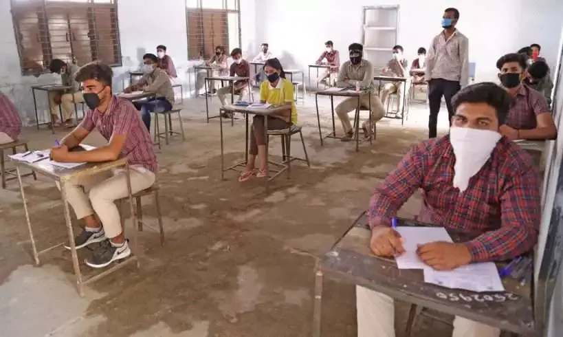 Vice-chancellor of R.G.V.P College Prepares for Online Exams 8 Students giving exams while maintaining social distance