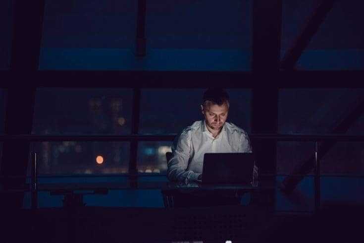 10 Signs of Brilliant Minds 10 A man working late at night