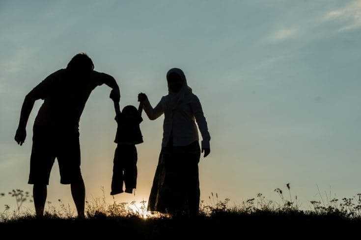 Homecoming Blood - An Exciting Mystery 10 Parents holding their son's hands