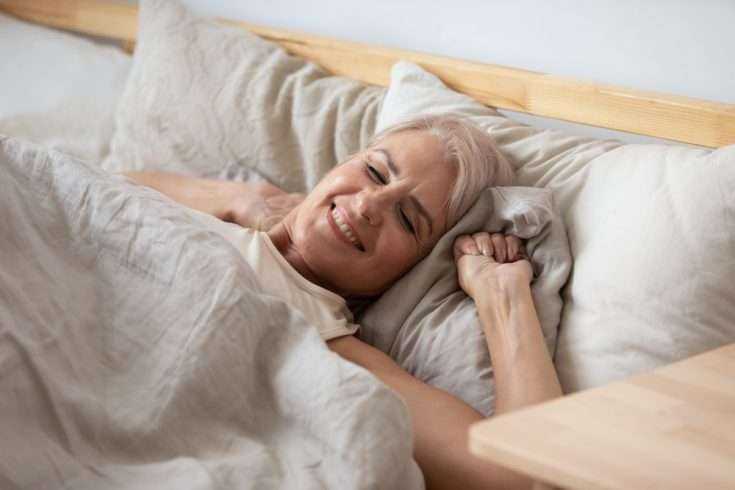 Ways To Sleep Better At Night 10 Woman relaxing before sleeping