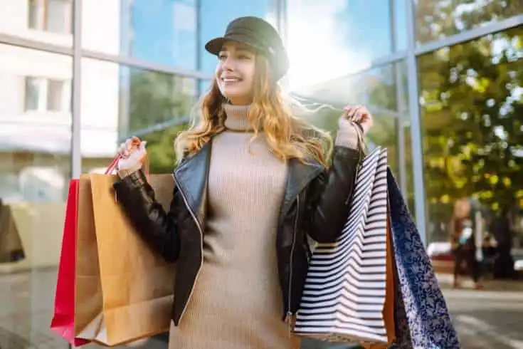 The Fuss Of Shopping 9 Woman holding shopping bags