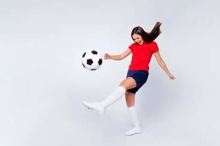 Color Psychology - 5 Best Ways to Use Them in Reality 9 Woman wearing red coloured shirt and playing football