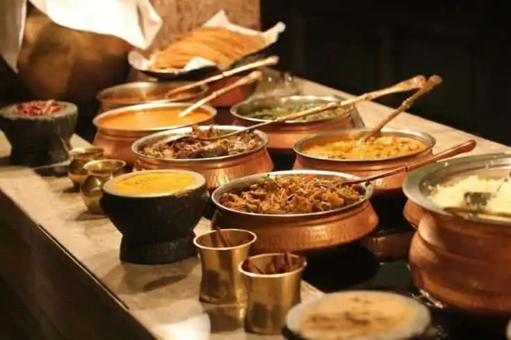 30 Best Restaurants in Bangalore For Foodies 9 Image of Indian food decorated in a buffet restaurant