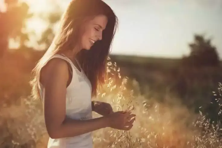 Beautiful side profile of a woman smiling