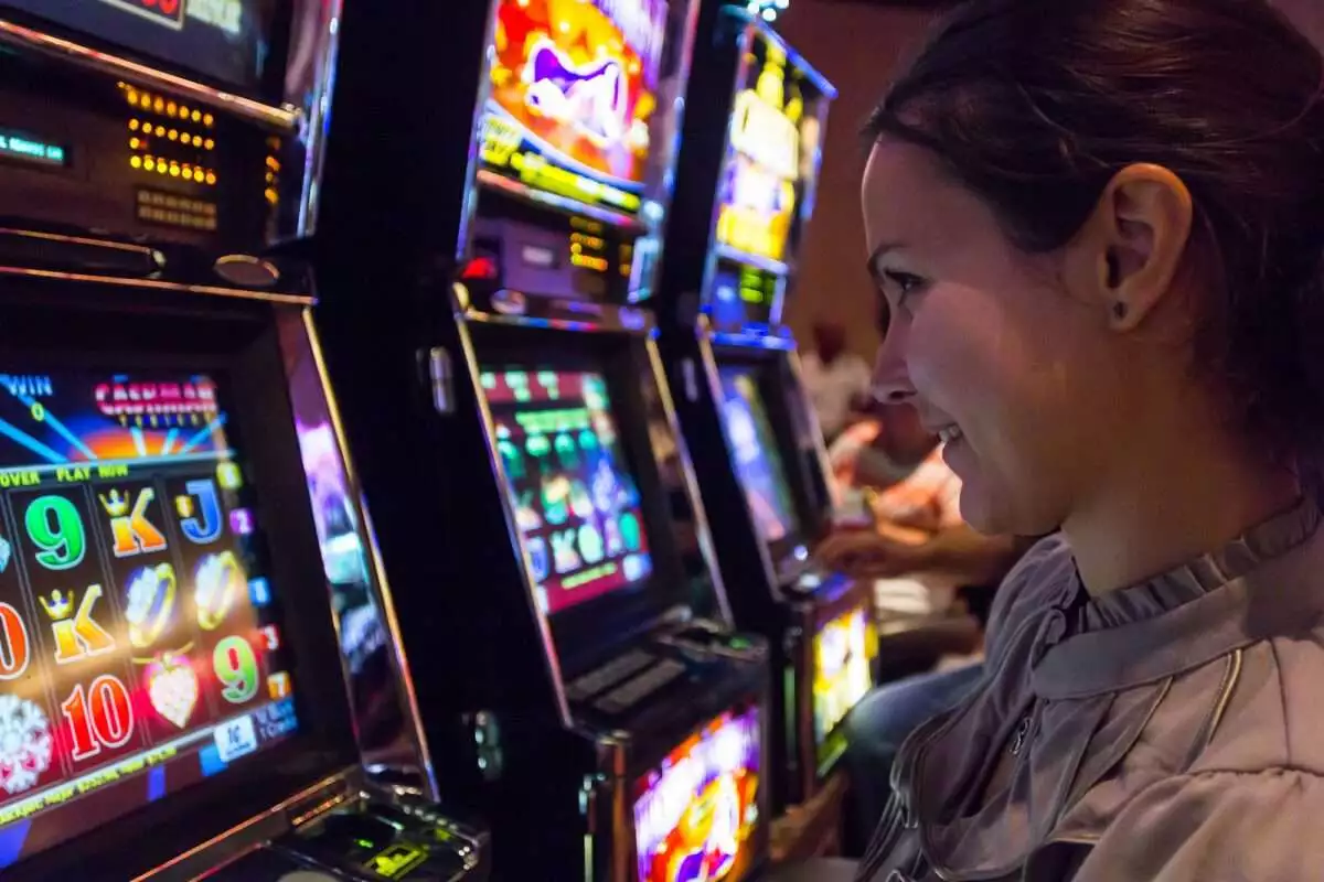 Las Vegas, NV, USA - 13th July 2013: Concentrated girl playing slot machines in The Quad Resort and Casino.
